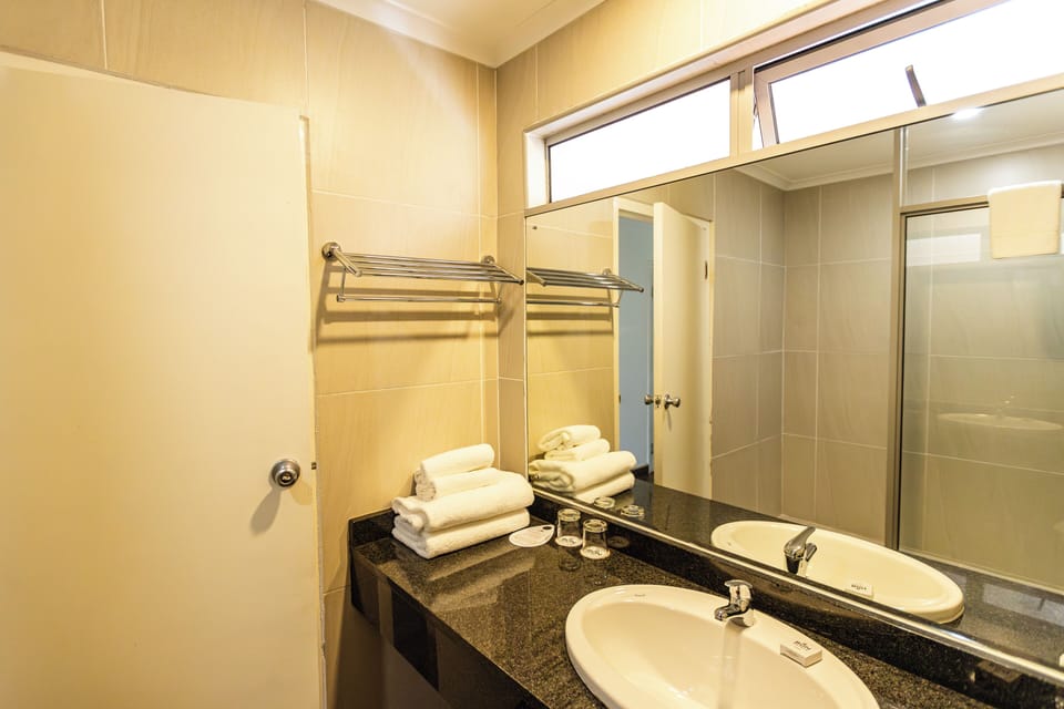 Superior Room | Bathroom | Eco-friendly toiletries, hair dryer (on request), towels, soap