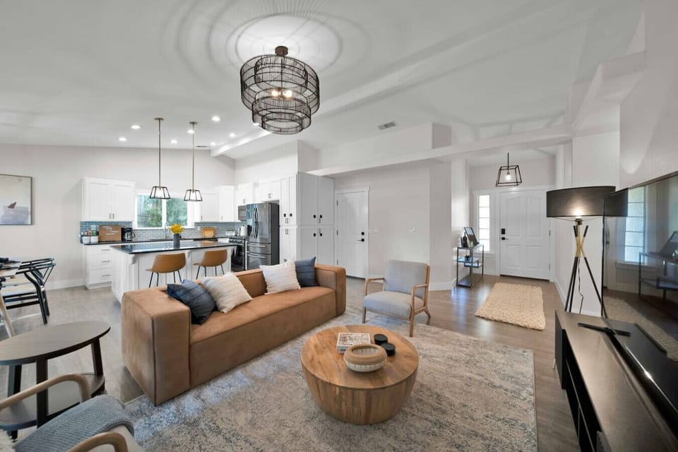Cozy living room, featuring comfortable seating and a dedicated relaxation space.