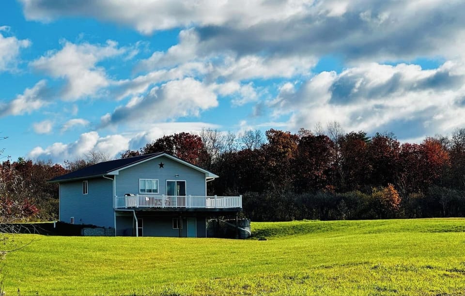 Tucked amid wide-open fields, this serene retreat offers the perfect blend of peace, privacy, and countryside charm. 