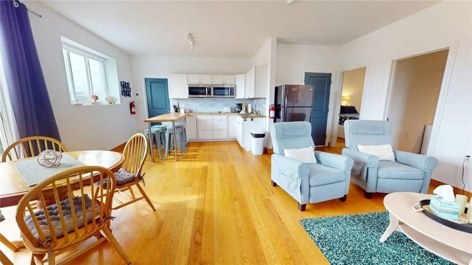 An inviting open concept living space designed for connection. It's where cozy comfort meets contemporary charm. 