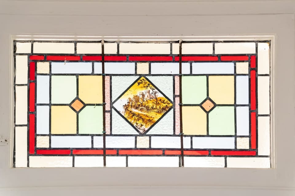 Historic stain glass windows throughout the property