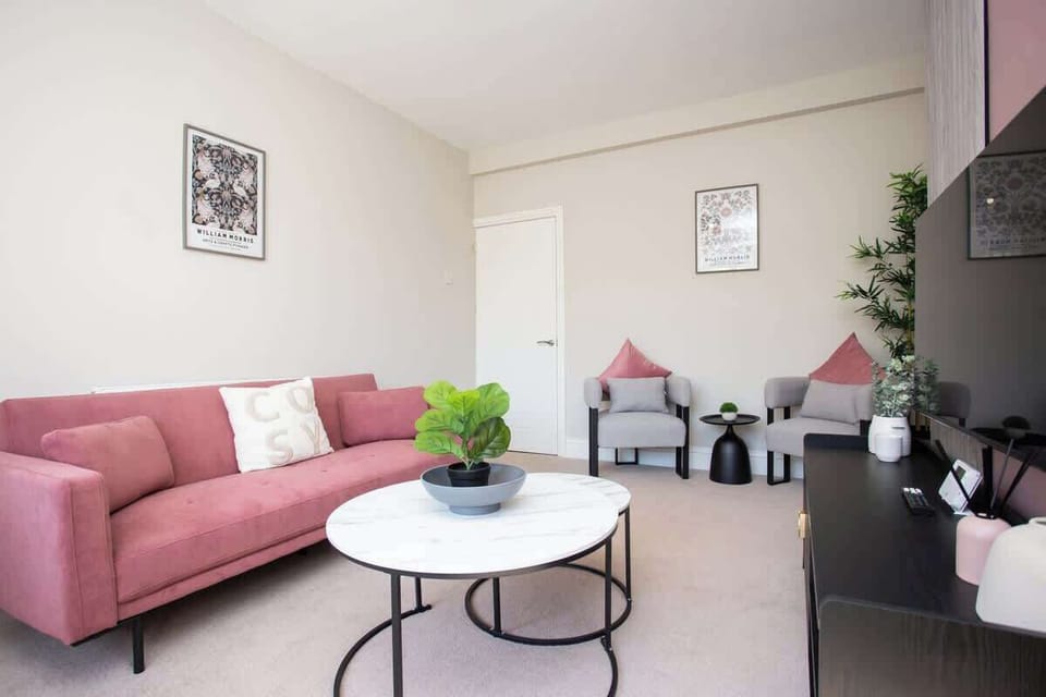 Relax in this cozy living room with plush seating and a smart TV for your entertainment