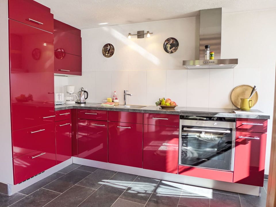 Kitchen, Red, Kitchen Appliance, Cabinetry, Major Appliance, Flooring, Countertop, Interior Design, Furniture, Floor