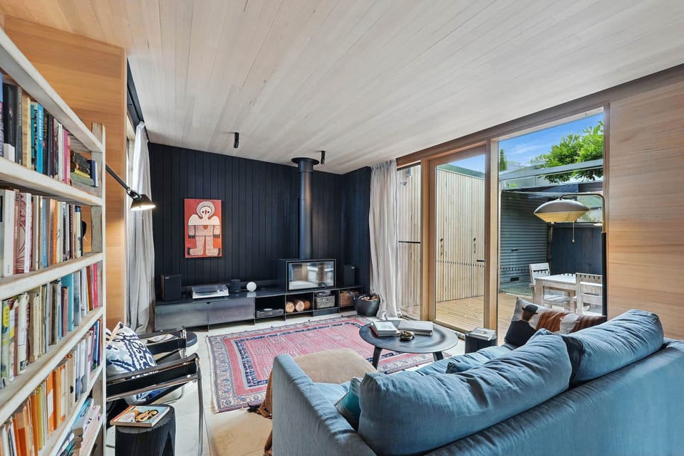 Artful Stay with Library Wall & Fireplace