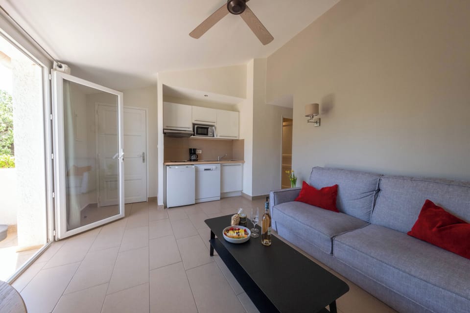 Apartment, 2 Bedrooms (6 people) | Living area | Flat-screen TV