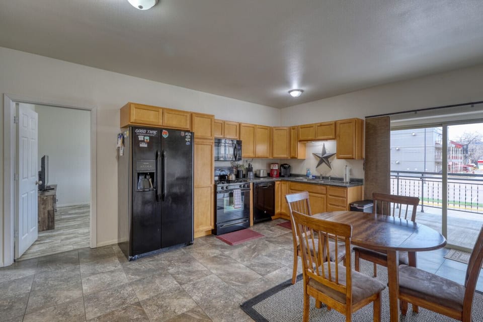 Spacious kitchen w/ balcony access
