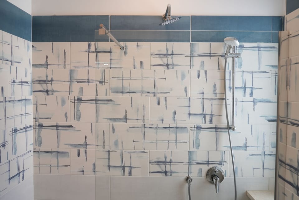 Room, City View | Bathroom | Shower, hair dryer, towels, soap