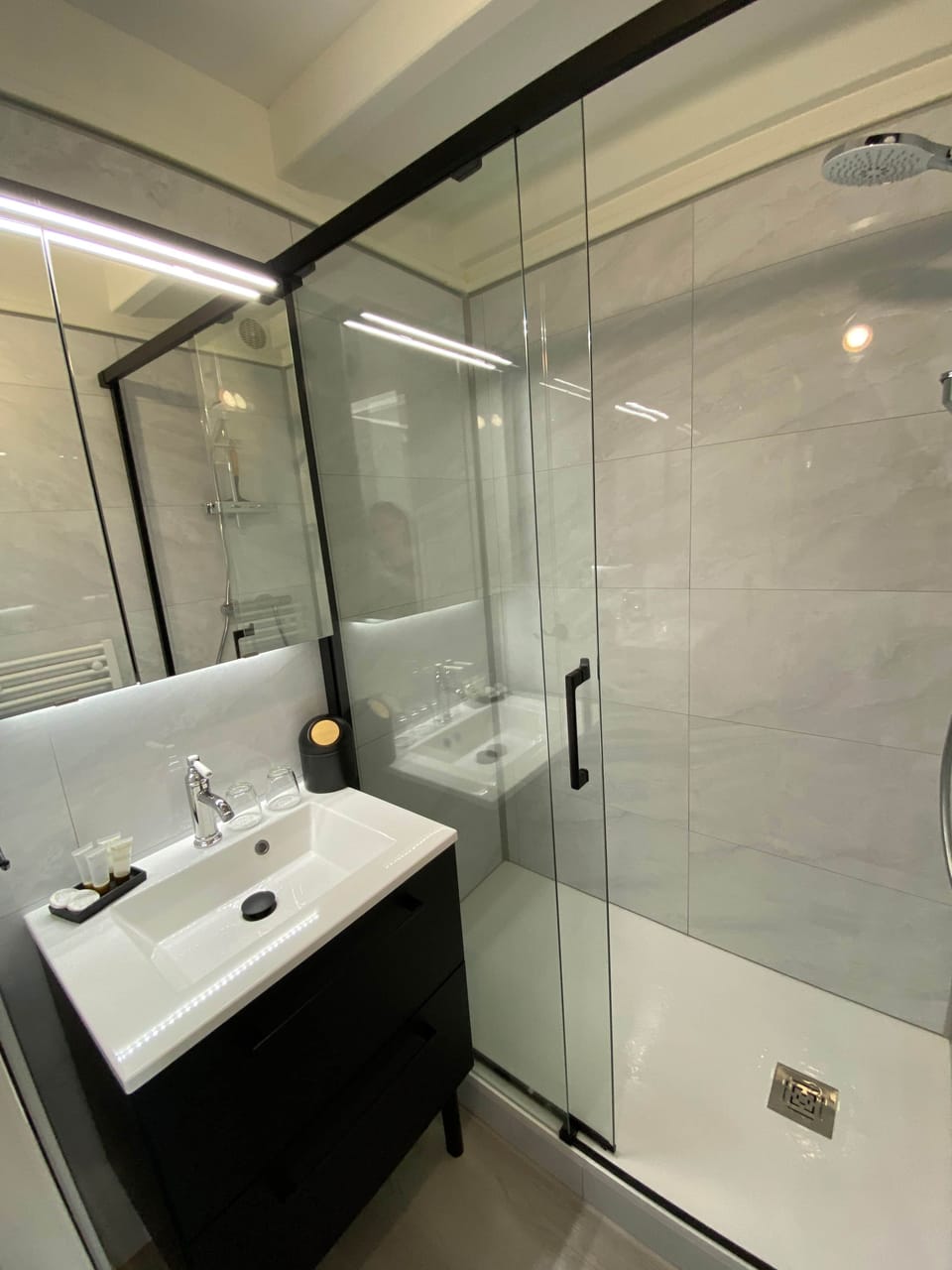 Bathroom with large walk-in shower and vanity unit