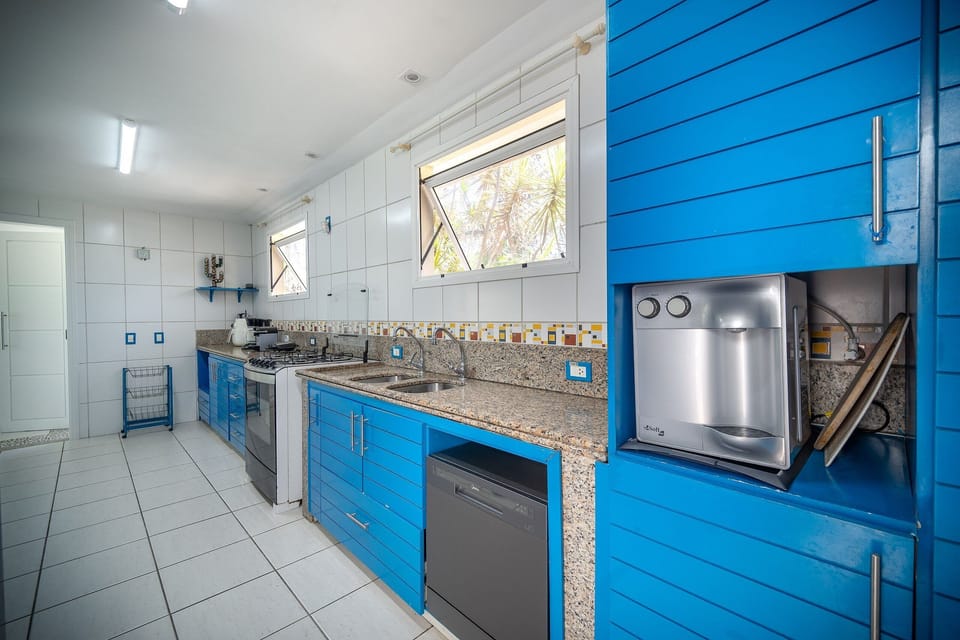 Villa | Private kitchen | Fridge, microwave, oven, stovetop