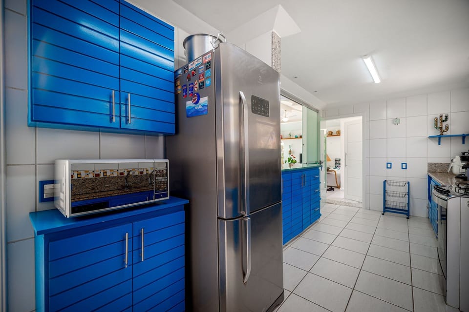 Villa | Private kitchen | Fridge, microwave, oven, stovetop