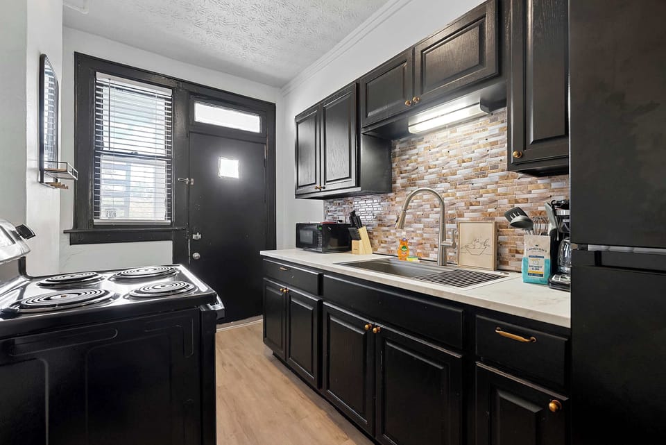 Apartment, Multiple Beds, Patio, Garden View (Merion Village Residences 1166) | Private kitchen | Fridge, microwave, oven, stovetop