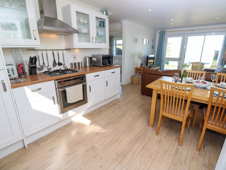 Fridge, microwave, toaster, cookware/dishes/utensils