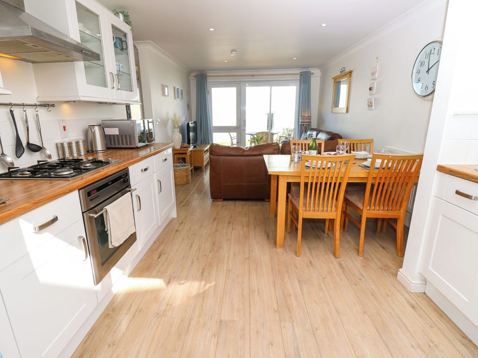 Fridge, microwave, toaster, cookware/dishes/utensils