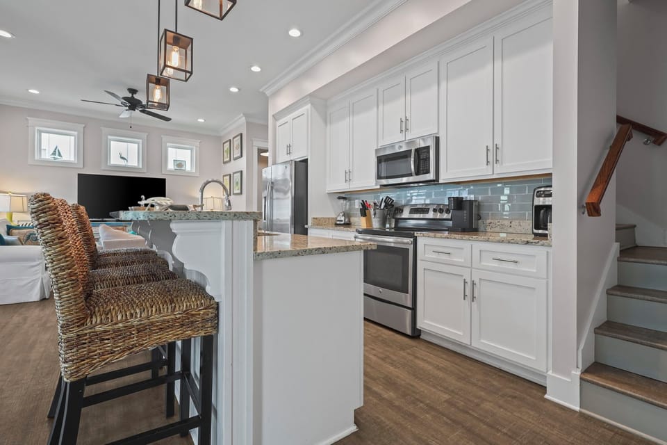 Fully equipped kitchen with dishwasher, microwave, stove, oven and Keurigs