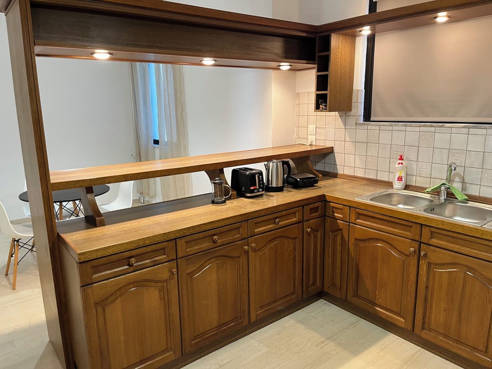 Apartment, Sea View | Private kitchen | Espresso maker, electric kettle, toaster