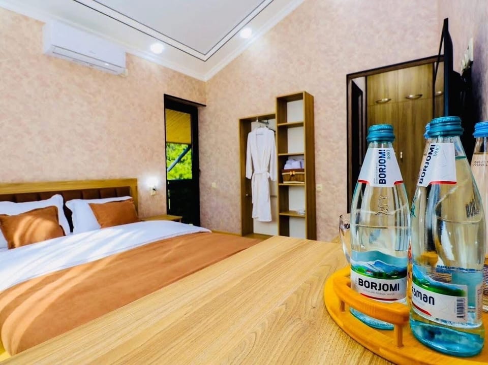 Comfort Double Room, Balcony, Mountain View | Living area | TV