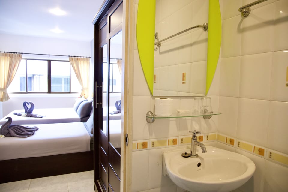 Standard Triple Room | Bathroom | Shower, towels, soap, toilet paper