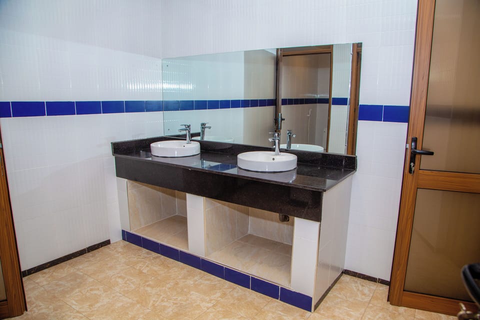 Shower, slippers, towels, soap