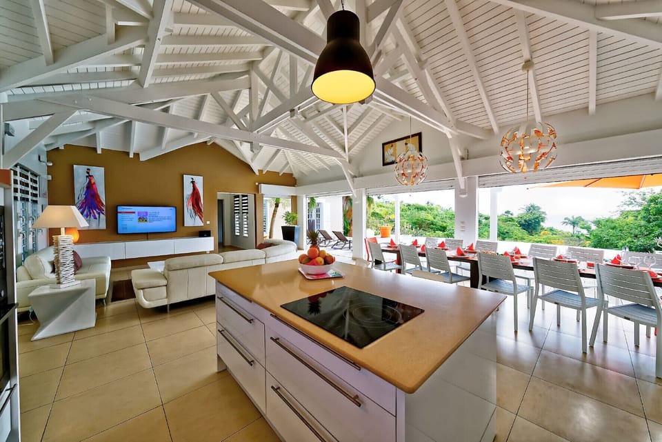 Beautiful kitchen opening onto the living room and terrace