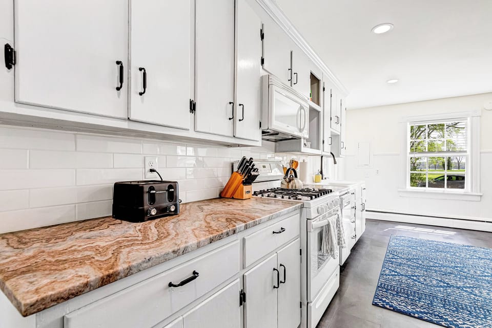 Fully Stocked Kitchen: Whip up culinary delights in this stylish space with modern appliances and flair!