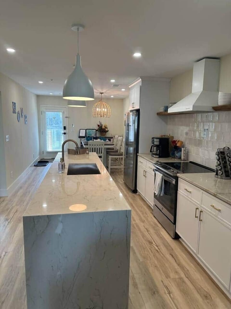This modern and spacious kitchen has everything you could want to make meals. 
