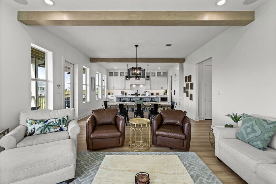 Plenty of space to stretch out in this airy, open living room — perfect for relaxing after a day at the beach