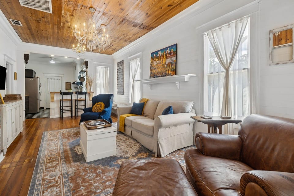 Two person sofa, 2x accent chairs, Smart TV. Appreciate the historical accents with a modern touch.