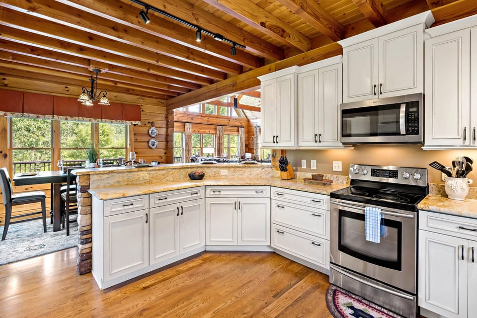 Kitchen with dishwasher, standard drip-style coffee maker, Keurig coffee maker, and coffee grinder