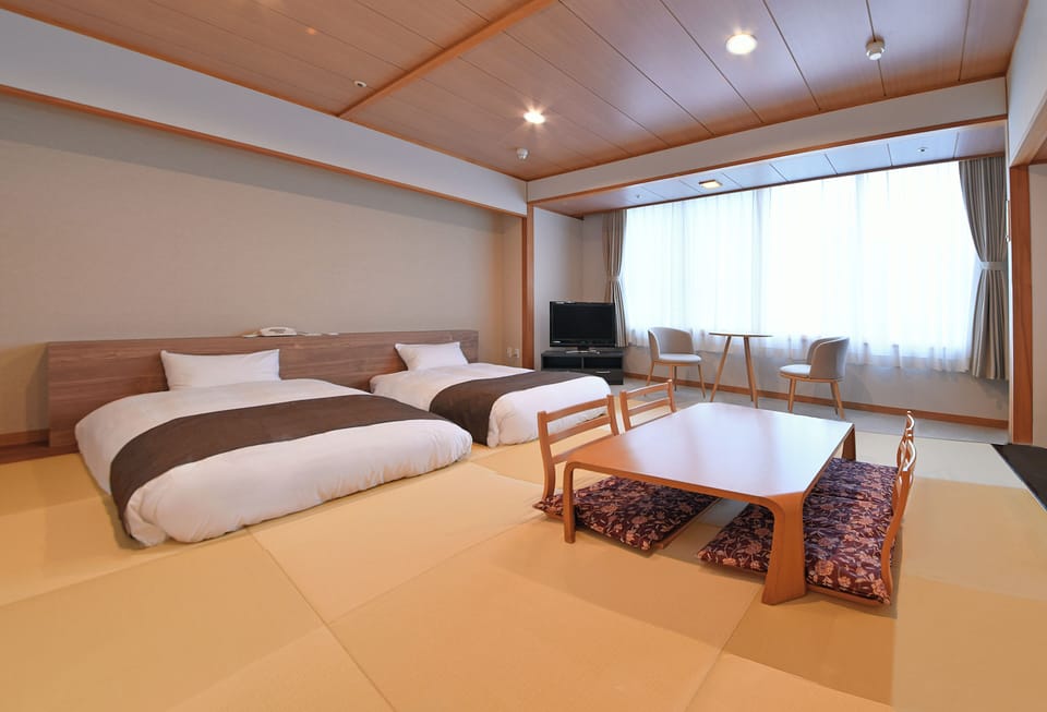 Japanese-style Room, Non Smoking with toilet | Bed sheets
