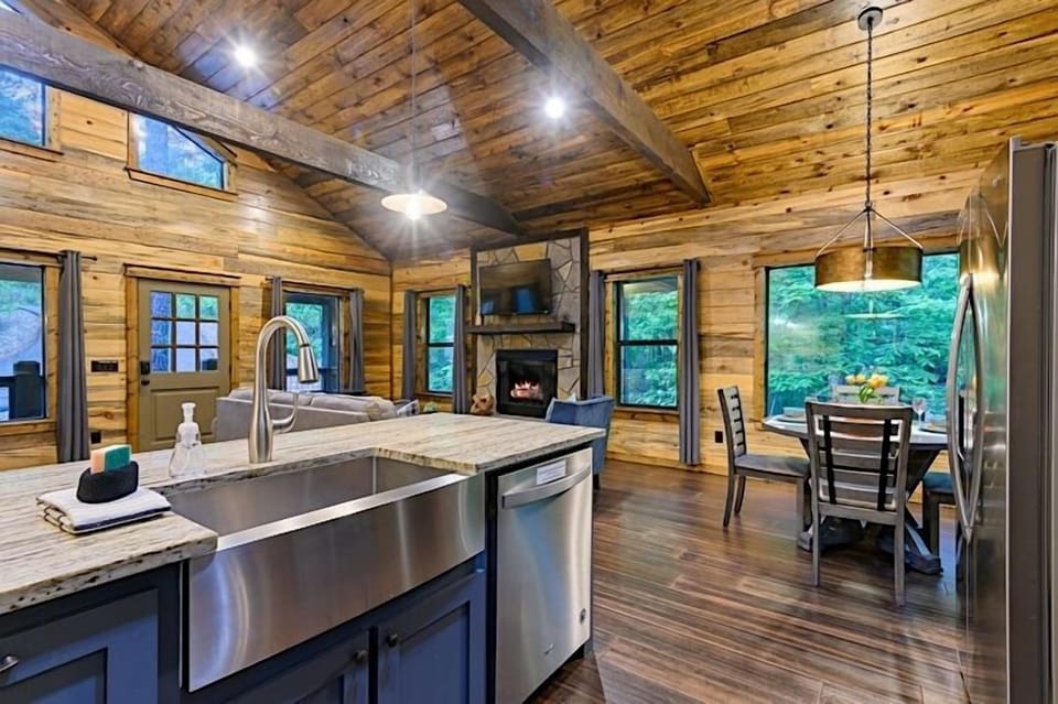 Open floor plan connects the living, dining and kitchen areas which allowing more natural light
