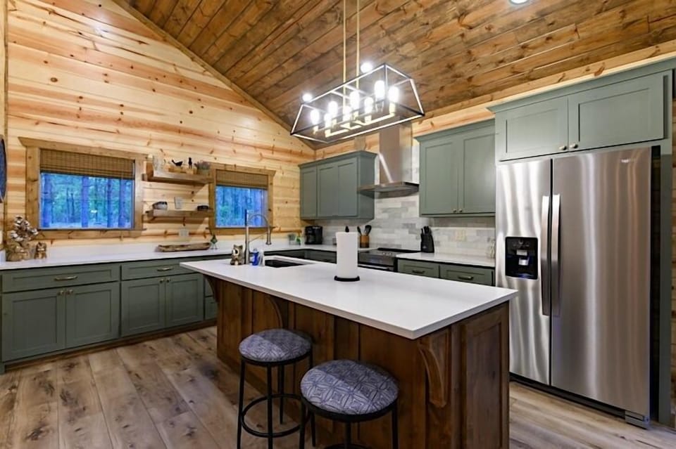 Full kitchen with tons of cabinets and beautiful quartz counters