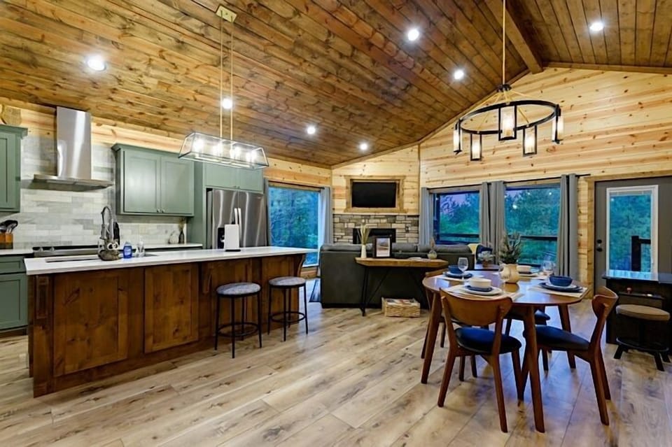 Open floor plan connects the living, dining and kitchen areas