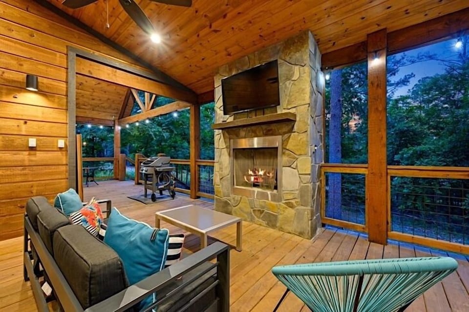 Comfortable seating, fireplace, smart tv, grill and nature