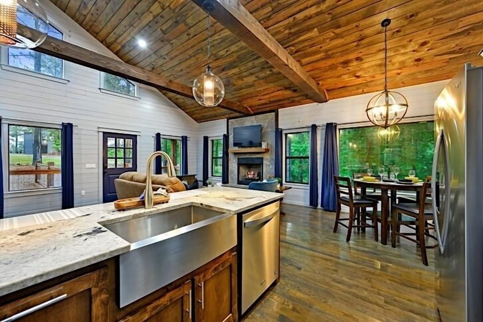 Open floor plan connects the living, dining and kitchen areas
