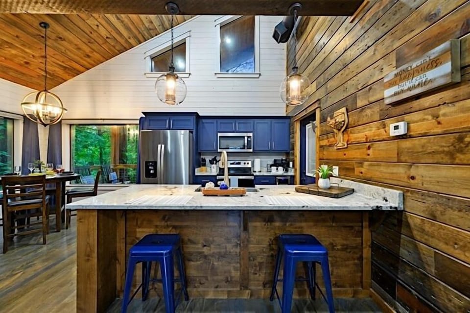 Full kitchen includes a wine refrigerator and mounted wall wine glass container for your corks