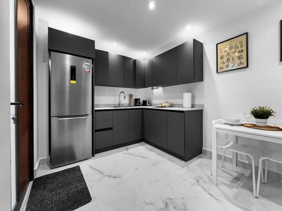 Experience a fresh inviting kitchen where natural light and clean design make cooking feel effortless