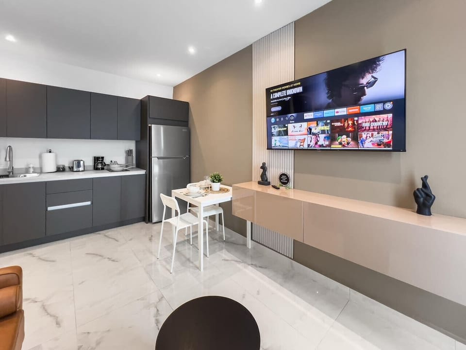 Enjoy a comfortable space with a large TV that makes movie nights relaxing simple and enjoyable