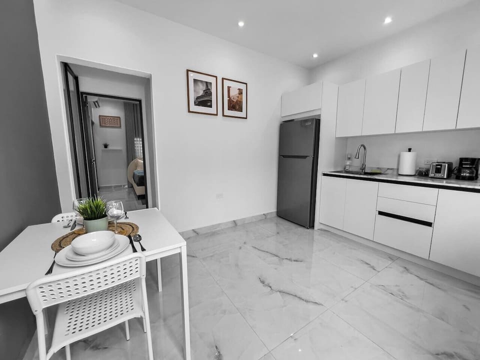 Relax in a beautifully arranged kitchen that offers warmth functionality and a calm space to enjoy your time