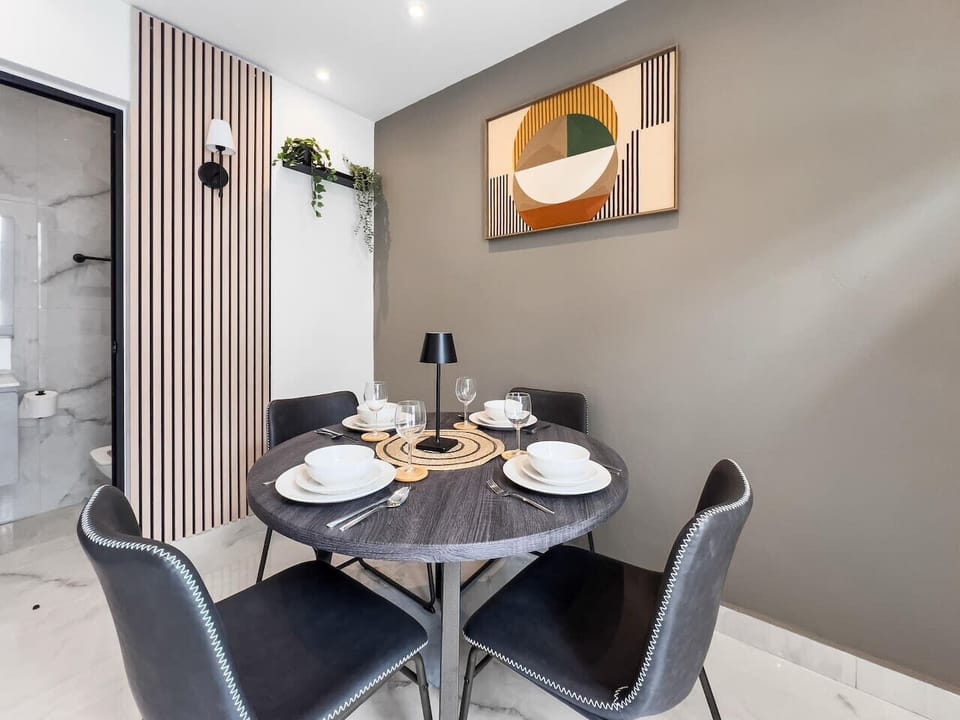 Relax in a spacious dining setting that encourages togetherness relaxation and simple enjoyable meals