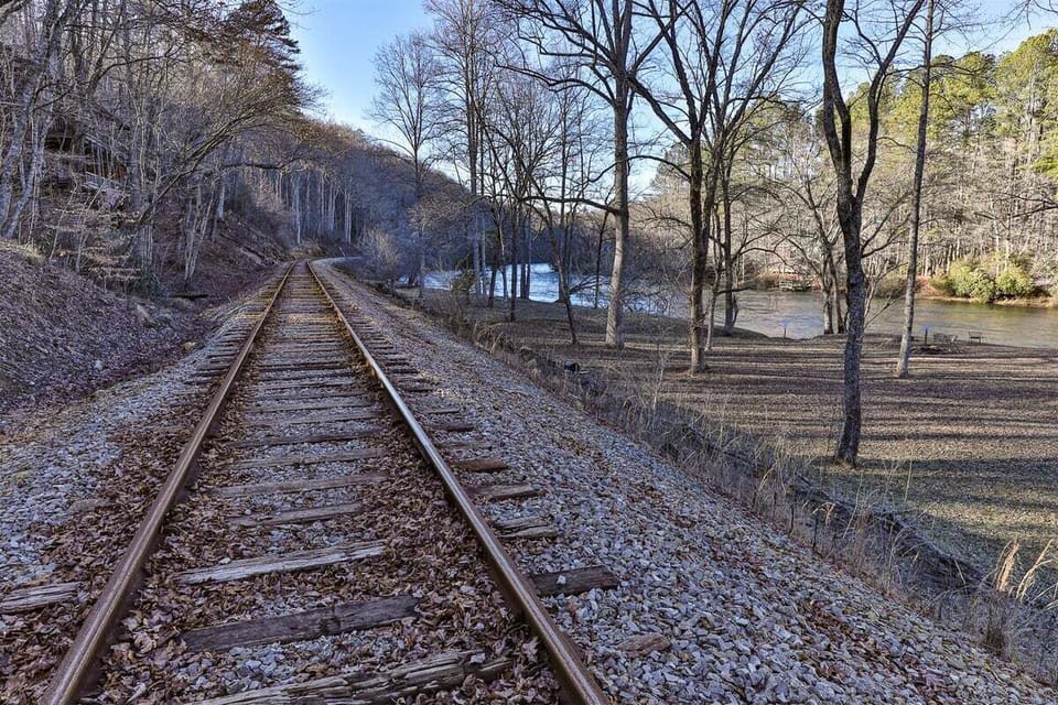 Train tracks by water front