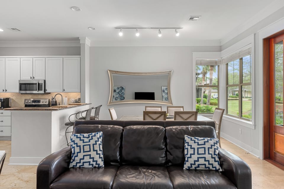 Alternate angle of the living area showcasing its spaciousness and design detail.