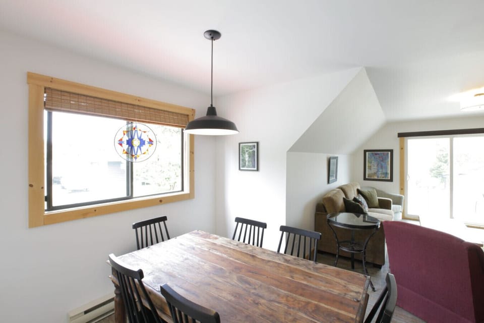 Bright dining area with seating for 6