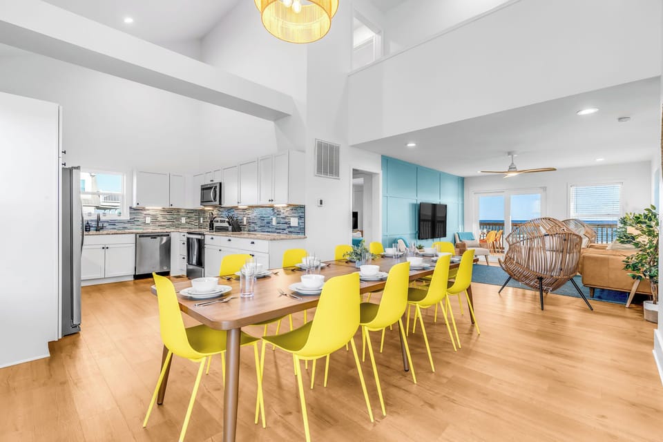 Dining area with seating for 10, all dinnerware & cookware available for use. 