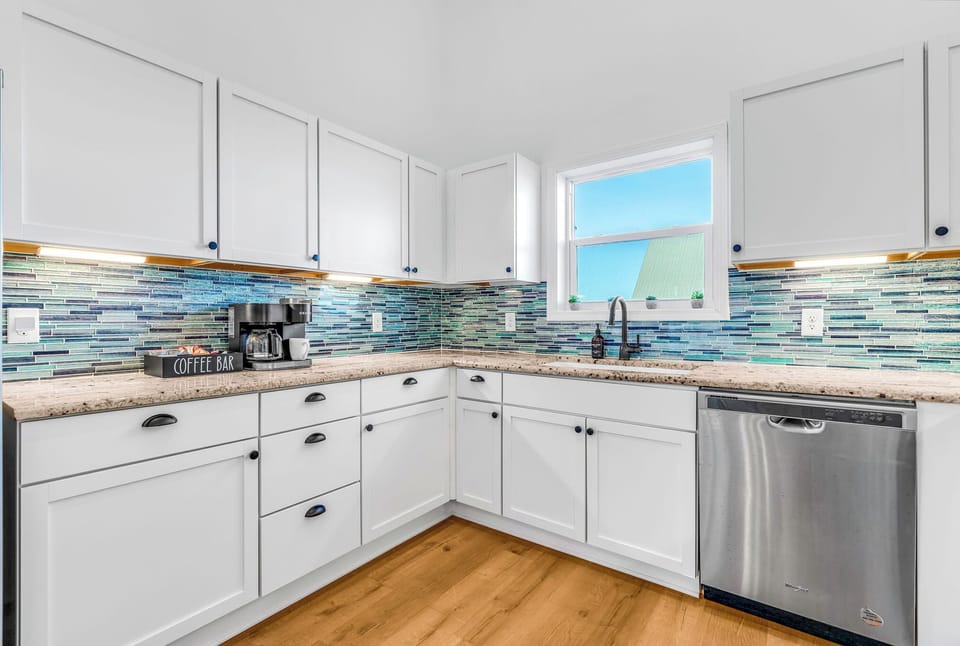 The bright open kitchen, equipped with everything needed to prepare all meals. 