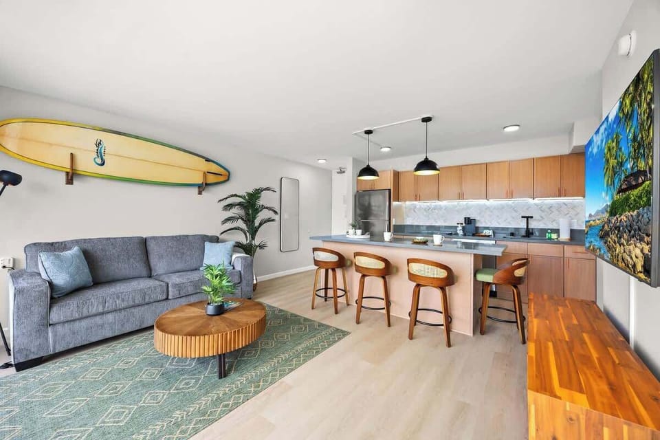 Overview of the living area, dining area, and kitchen