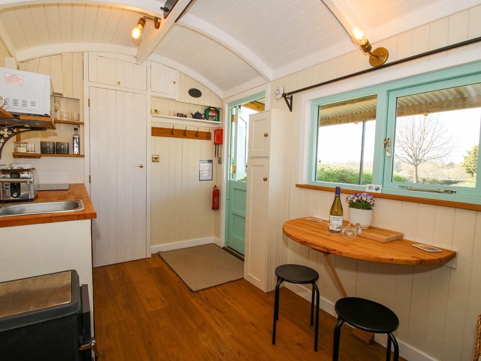 Fridge, microwave, toaster, cookware/dishes/utensils
