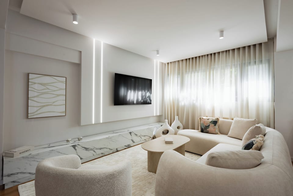 Luxury Apartment | Living area | 65-inch Smart TV with digital channels