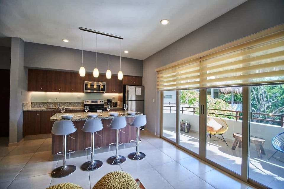 Fully Equipped Kitchen with Bar Counter