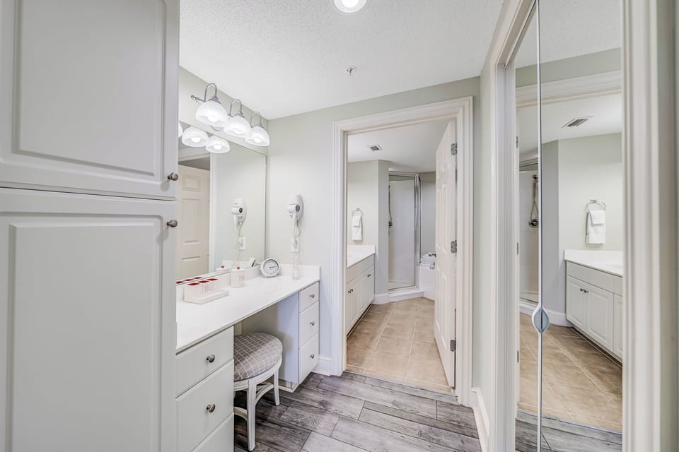 The master ensuite bathroom features a separate dressing area, spacious walk-in closet, double sinks, large soaking tub, and walk-in shower.