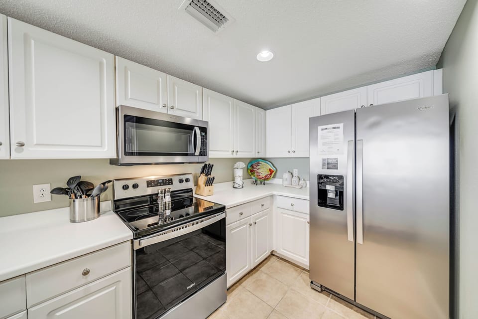 The fully equipped kitchen features stainless-steel appliances and has everything you need to prepare meals for family & friends.